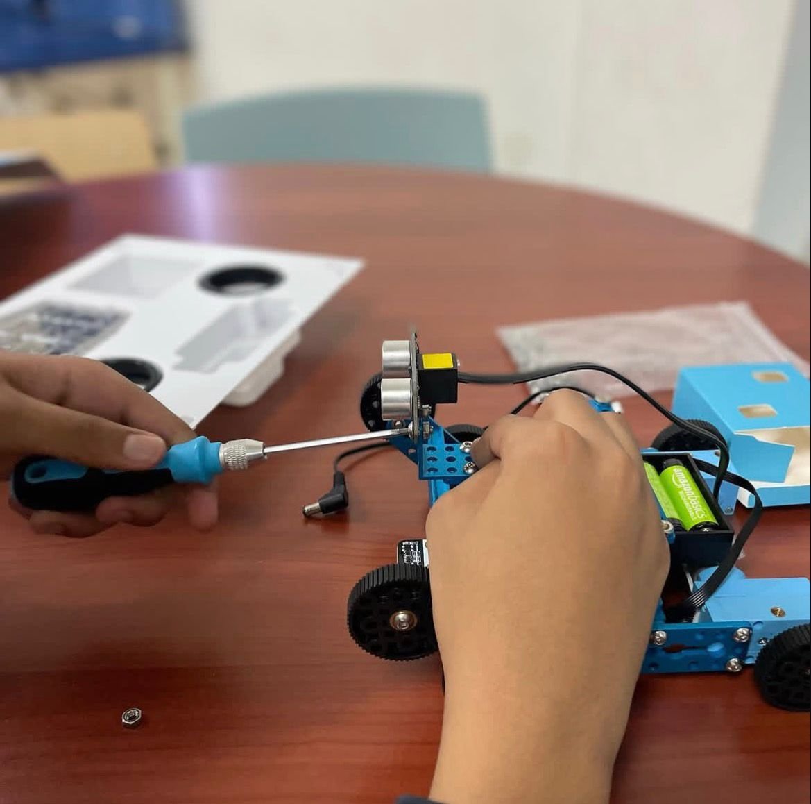 Student building robot